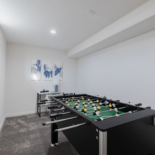 A small desk is included in the game room for your use. The foosball table will provide fun for hours!
