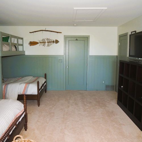 Bedroom #5 (second floor):  features two twin-on-full bunk beds, large dresser, closet, and great views of the backyard, long lake, and sleeping bear dunes.