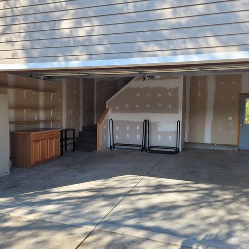 EXTERIOR:  Use of the rental includes use of the large 2-car garage.  Note that the stairs to the bunk room above the garage are at the back of the garage in the photo.