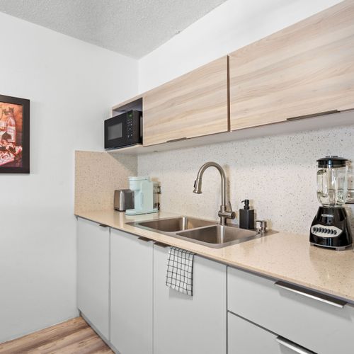 Grab a morning brew at our convenient coffee station, thoughtfully arranged to kickstart your day with everything you need.