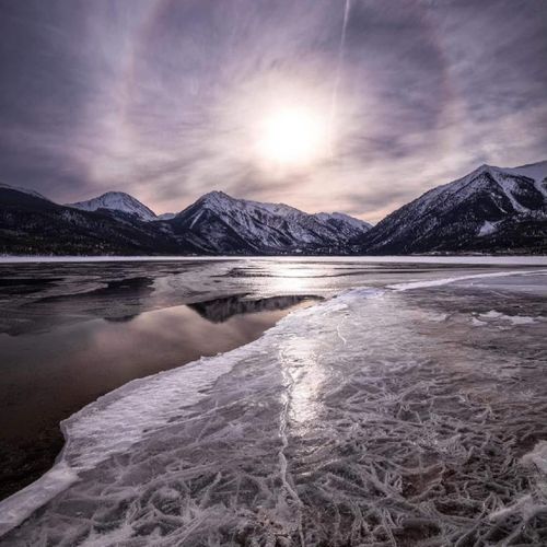 Golden skies meet tranquil waters: twin lakes, colorado, adorned by the beauty of a mesmerizing sunset.