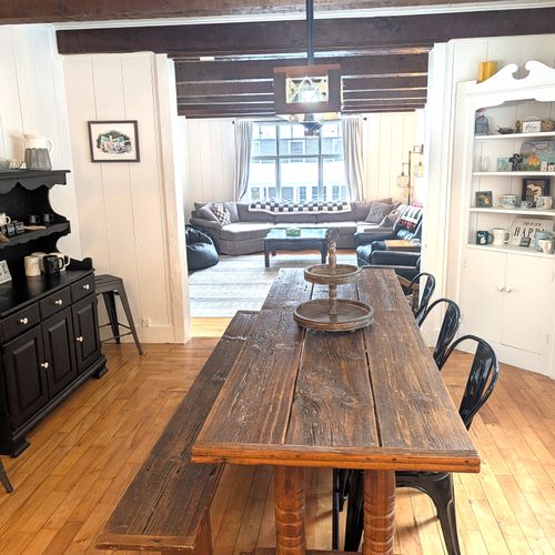 DINING ROOM (MAIN FLOOR):  Beautiful dining room with custom-made dining table that seats 8 adults