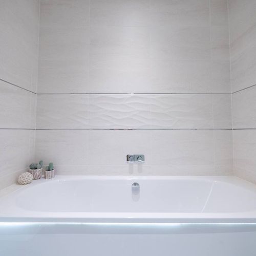 Bathroom with bath, shower, toilet and sink
