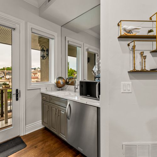 There’s a stylish wet bar, perfect for evening drinks.