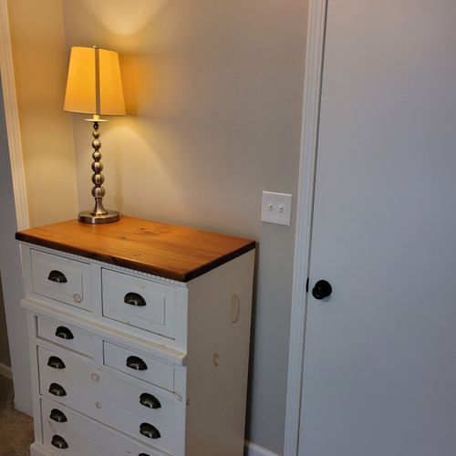 Bedroom #2:  features a twin-on-twin bunk bed, dresser, closet, and lamp