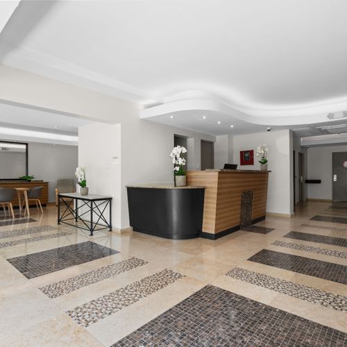 The lobby welcomes you with a touch of style and convenience.