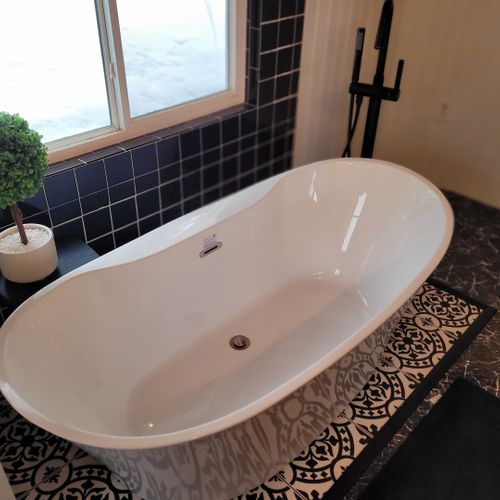 Bathroom #2 (second floor):  large and gorgeous bathroom with a soaking tub, walk-in shower, ceiling fan, mirror, vanity, sink, and a toilet with a bidet.