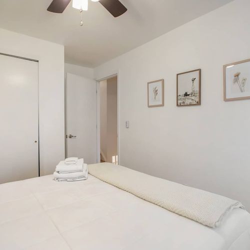 Sink into our plush and cozy bed linens for a restful night's sleep. For added convenience, towels and toiletries are also provided.
