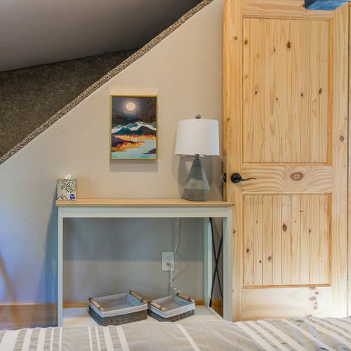 Enjoy the sun-filled living space from the bunk beds.