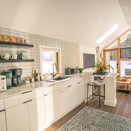 Views from the cozy kitchen toward the living room