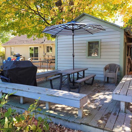 OVERVIEW:  The large and family-friendly backyard with back porch, propane grill, outdoor dining, lawn games, and a "smokeless" bonfire ring.