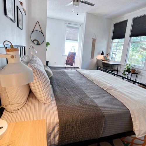 Soft pillows & layered bedding invite you to slow down & rest.