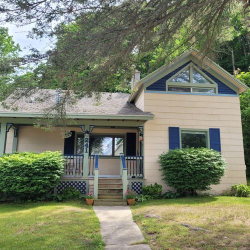 Overall:  the front of the house and the charming front porch.