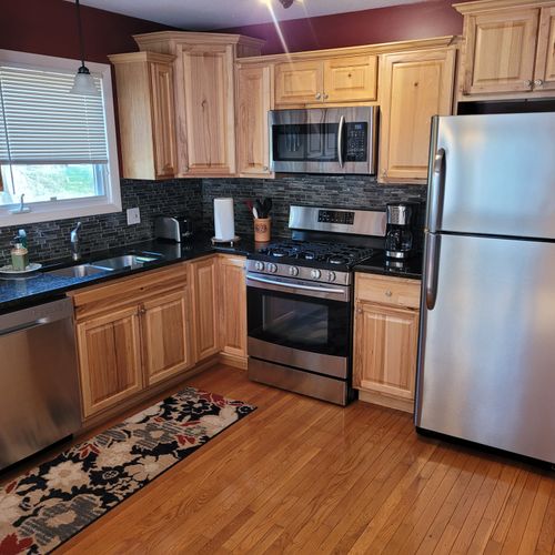 KITCHEN:  The home has a very modern kitchen with all appliances including a dishwasher.