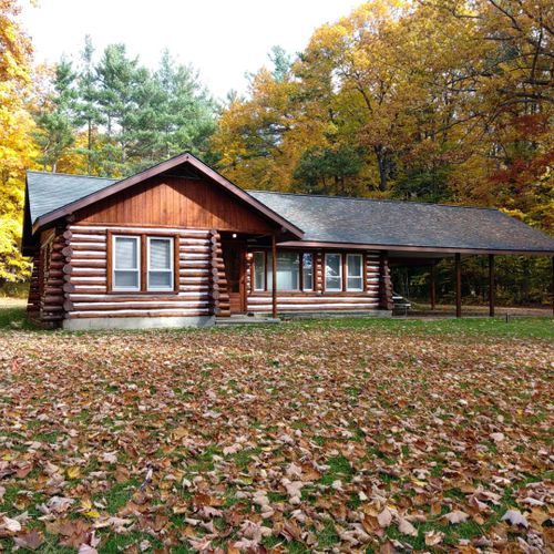 Overall:  the front of the cabin in fall.