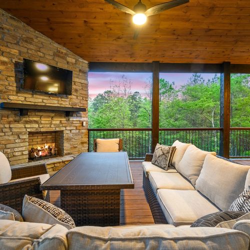 Oversized outdoor sectional around the fireplace!