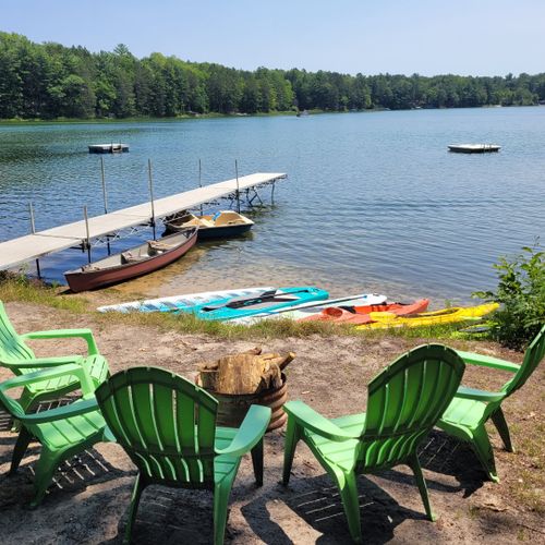 Overall:  the private lakefront, bonfire ring, dock, swimming raft, pedal boat, canoe, kayaks, and paddleboards.