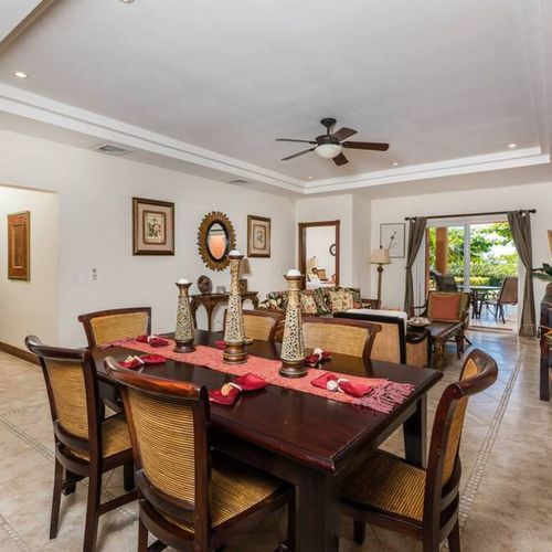 The living room is just past the dining area.