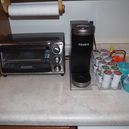 Kitchen:  very convenient and modern kitchen with all appliances including a dishwasher, microwave, toaster oven, and keurig coffee maker.