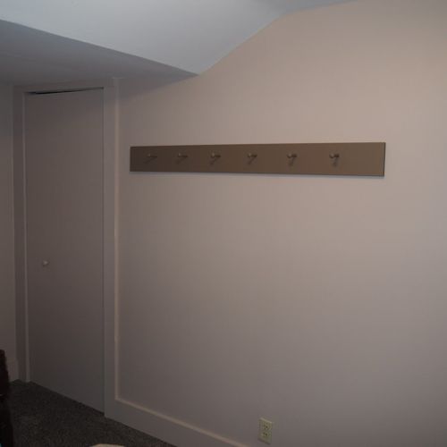 Bedroom #2:  features 2 twin beds, window a/c unit, nightstand, lamp, and mirror.
