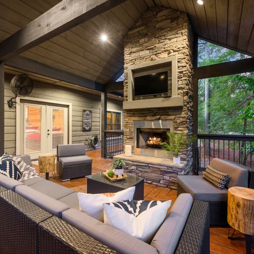 A gas fireplace is at the heart of the main outdoor living area!