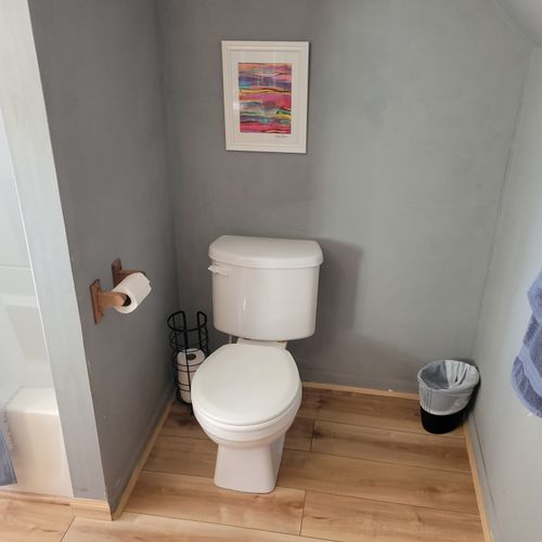 BATHROOM #1 (MAIN FLOOR):  This is a full private ensuite bathroom for Bedroom #1.  It includes a combination tub and shower.