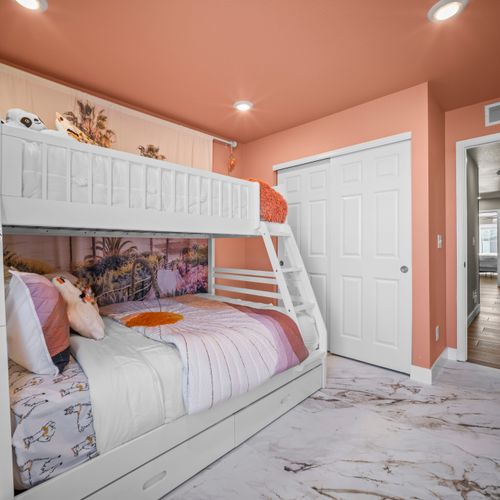Fun bunk room perfect for kids or extra guests.