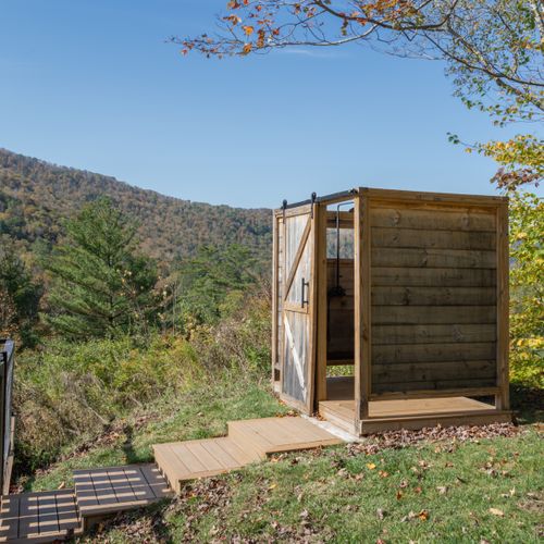 The outdoor shower is only steps from the pool deck.