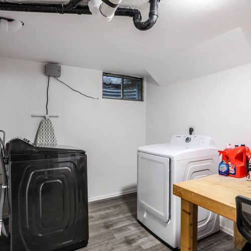 - keep things fresh with a convenient laundry space featuring modern washer and dryer
- folding table, detergent supplies, and hanging area make laundry day a breeze
- tucked away yet fully equipped for extended stays or quick refreshes