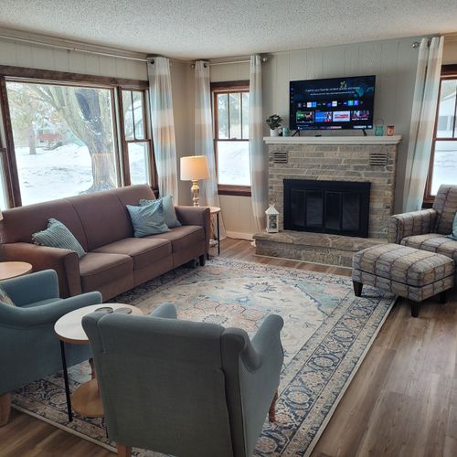 Living room:  the home has a very cute and cozy living room that includes a live streaming television with roku. Note that the indoor wood fireplace is not to be used by guests as it is unsafe to use!