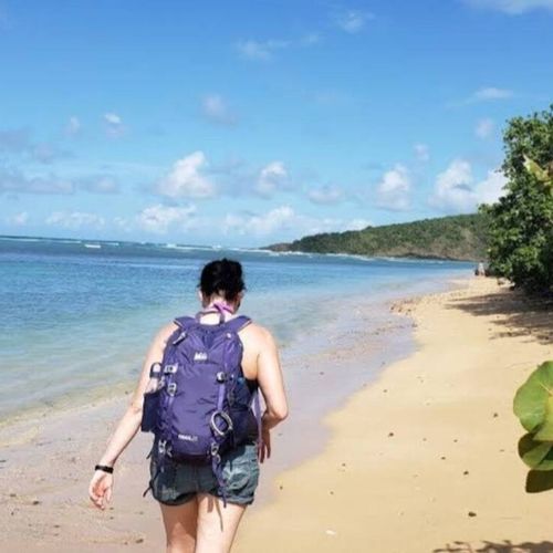 Your perfect escape awaits! Discover a serene coastline where calm waters stretch to the horizon, inviting relaxation and natural beauty.