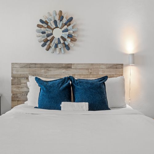 Your ultimate beachfront retreat awaits! This room provides ample space for up to four guests, a dedicated area for meals or work, and captivating views of the azure ocean.