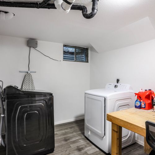 Finishing the lower floor is the laundry room stocked with the essentials.