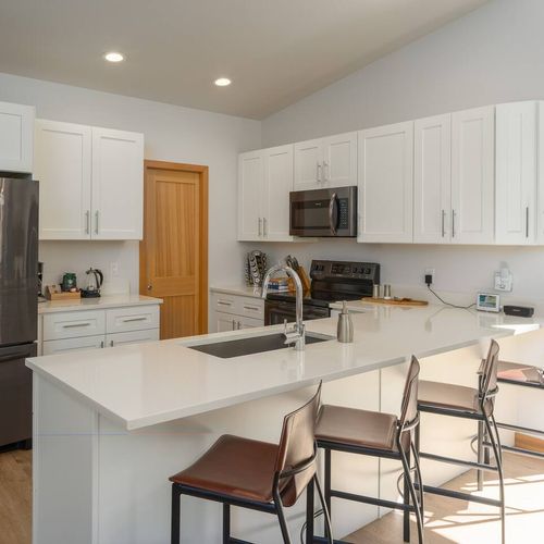 The kitchen is fully equipped with a fridge, coffee maker, and all the basics you need to cook and enjoy your meals.