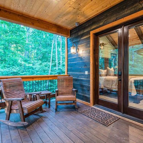 Rocking chairs on the covered patio accessible by the Master Suite.