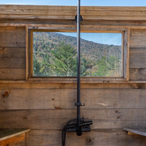 Shower under the open skies with a view that can't be beat.