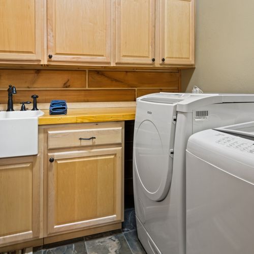 Laundry room:  large laundry room with washer and dryer on the main floor.