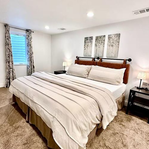 Escape to your own private oasis lower level master bedroom with a beautifully appointed ensuite bath.