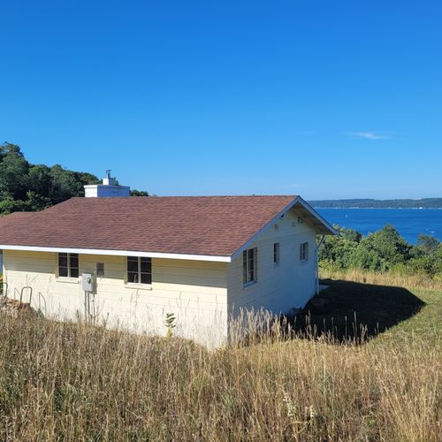 Exterior:  another view of the cottage with crystal lake in the backfround