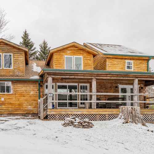 a beautiful front view of our log cabin