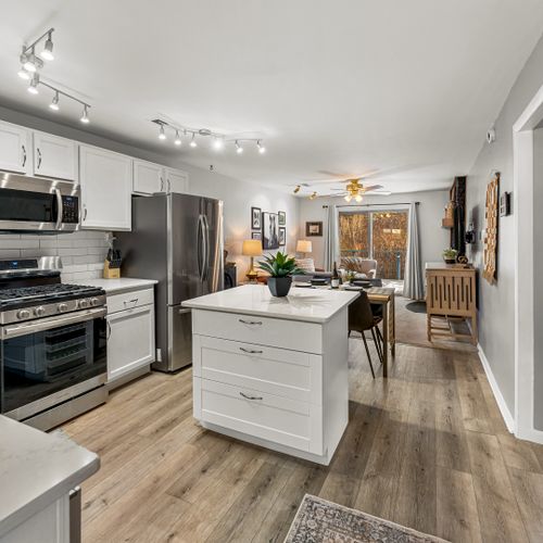Gather, dine, and relax in this bright and airy open-concept space crafted for your comfort.