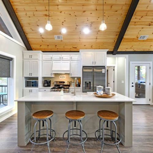 The kitchen offers additional seating at the bar top!