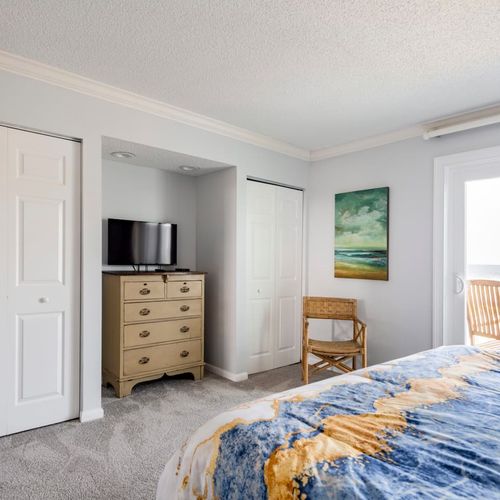 Enjoy ocean views from the comfort of your own bedroom! The main bedroom boasts an attached balcony.