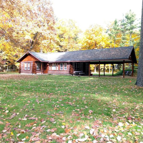 Exterior:  another view of the front of the cabin in fall.