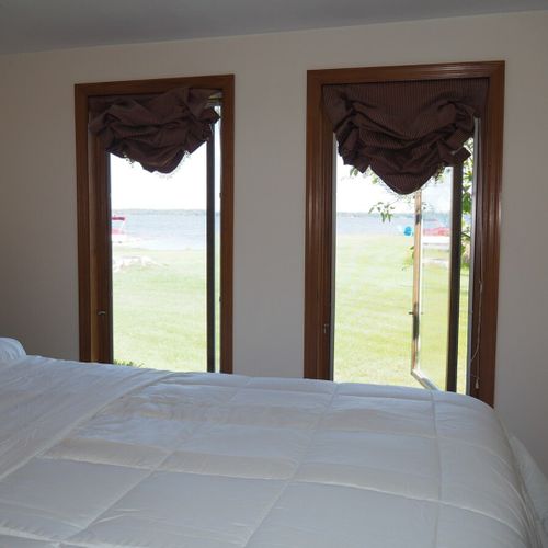 Bedroom #1:  features a queen-size bed, desk, and a nice view of lake michigan!