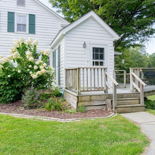 Walkway to the mudroom entry of the home.