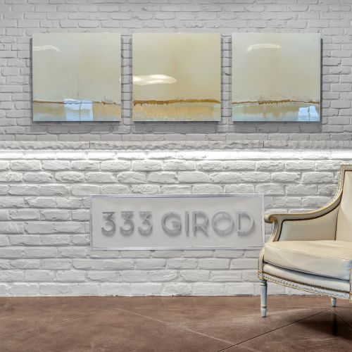 Historic "333 Girod" signage — a nod to the building's storied character.