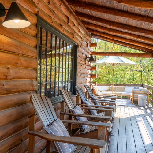 The porch is perfect for soaking up the mountain views.