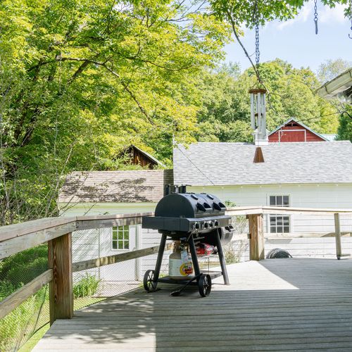 The soft sound of wind chimes is the perfect soundtrack for grilling on a warm night