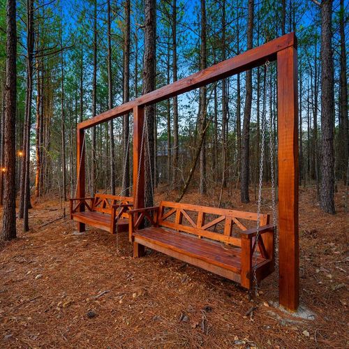 These beautiful swings allow for you to be part but not right next to the fire!
